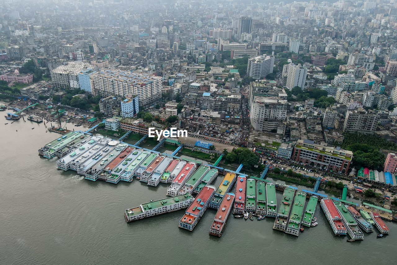 High angle view of illuminated modern buildings in city