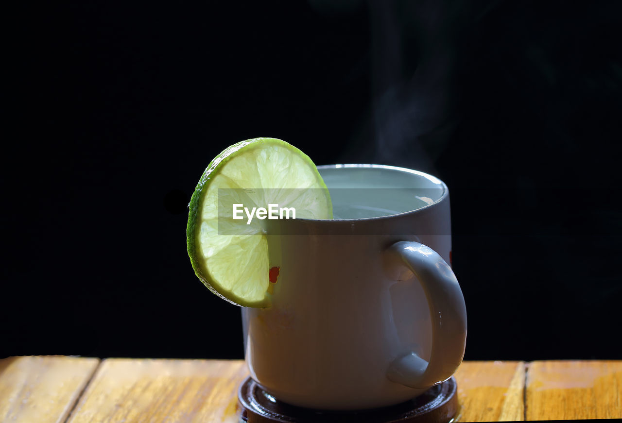 Close-up of drink served on table