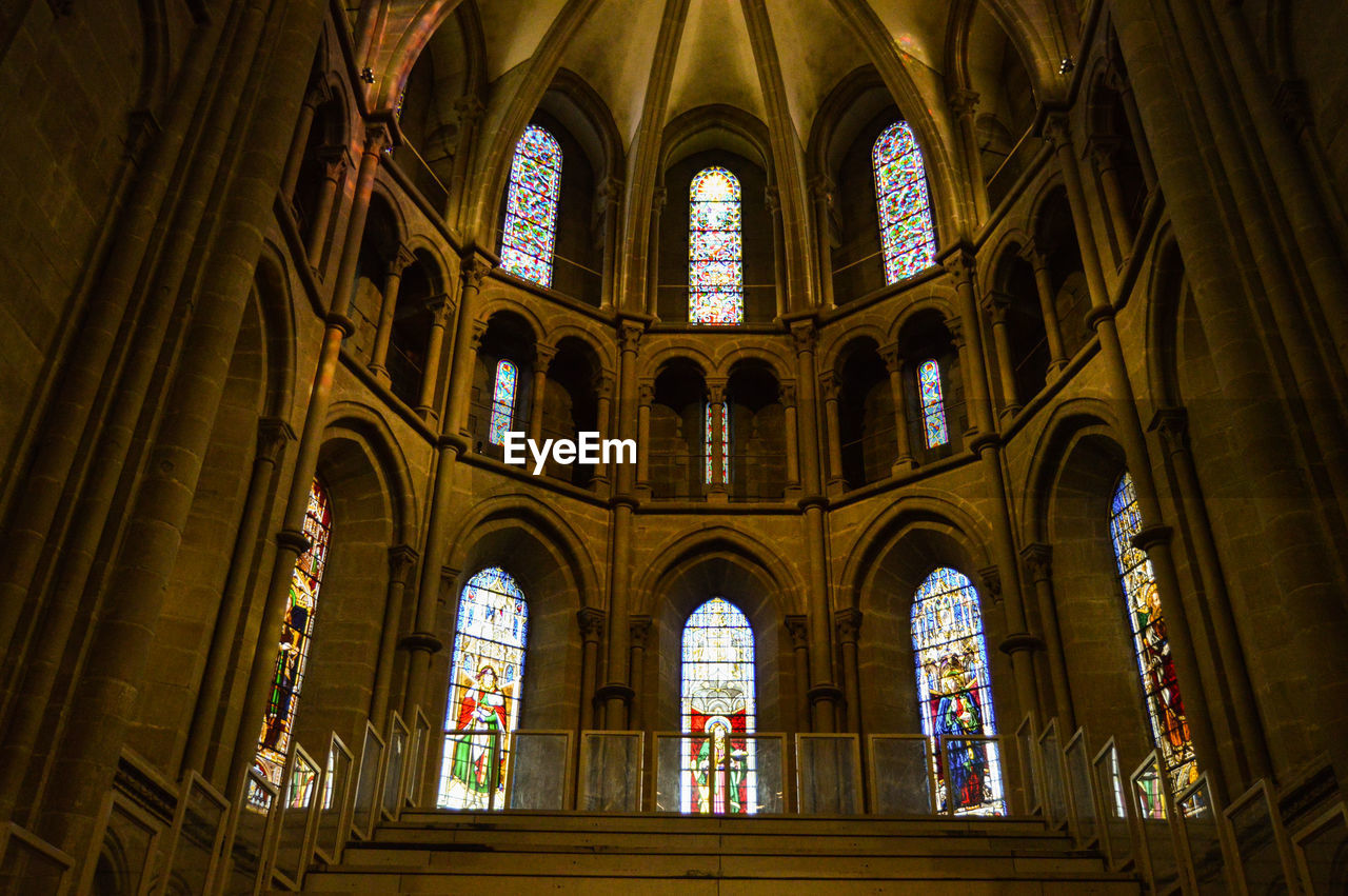 Low angle view of stained glass window of building