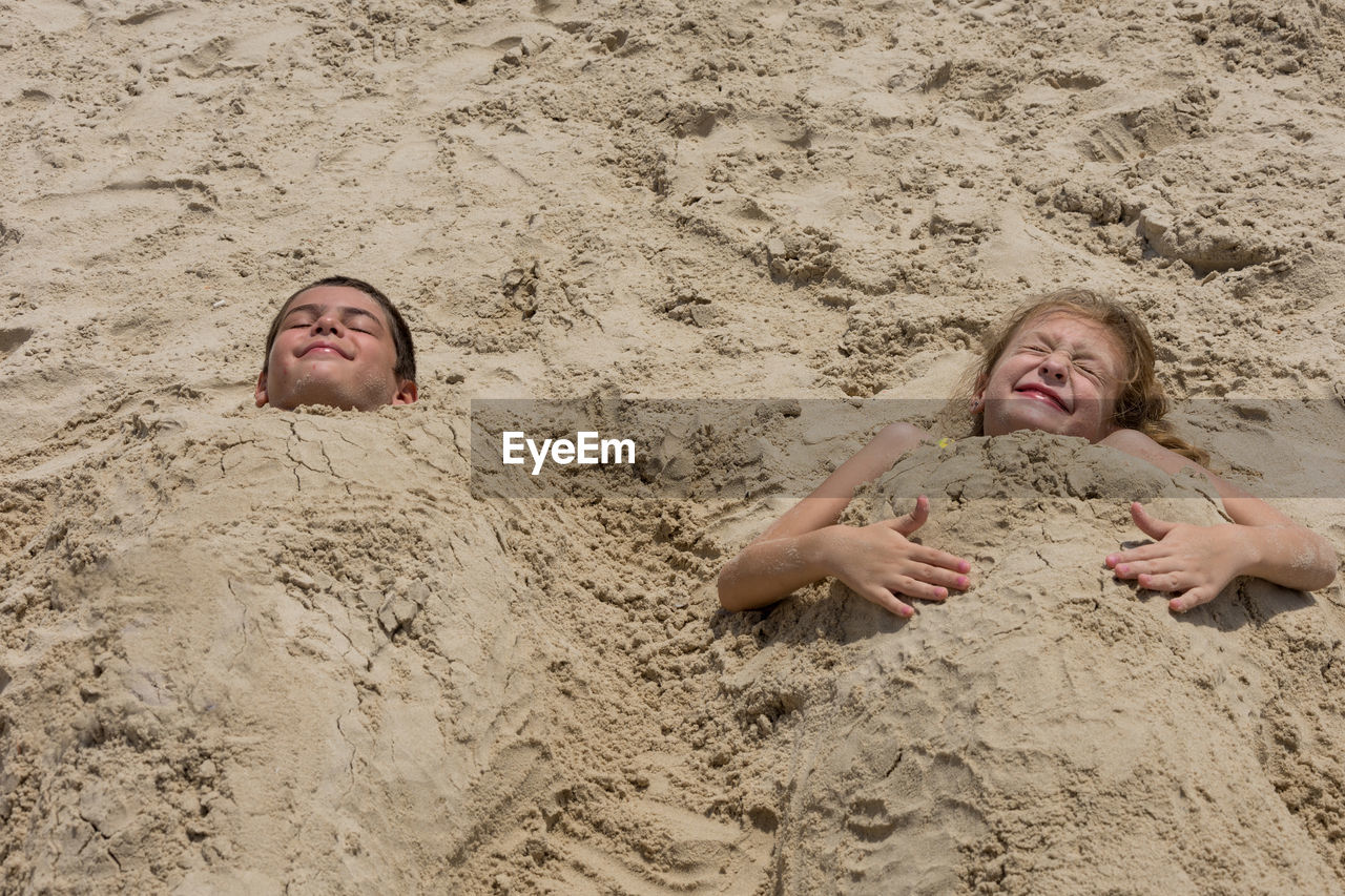 Funny children at the beach 