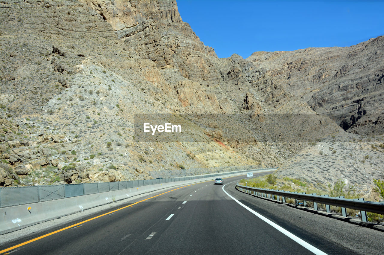 Close-up of road against clear sky