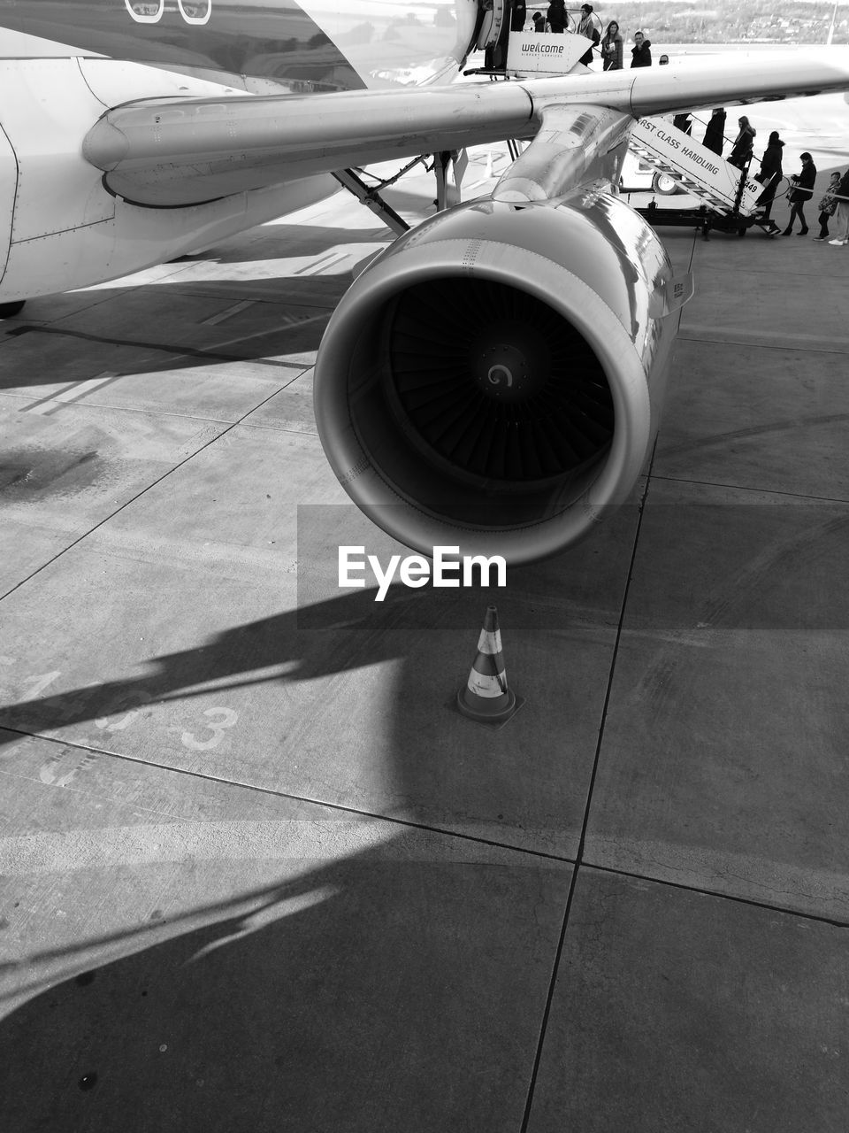 CLOSE-UP OF AIRPLANE AT AIRPORT