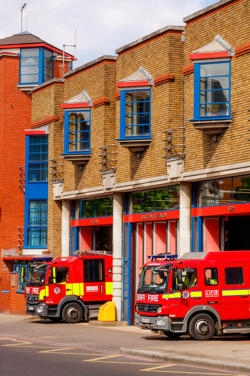 Fire brigade station with fire engines, islington, london uk
