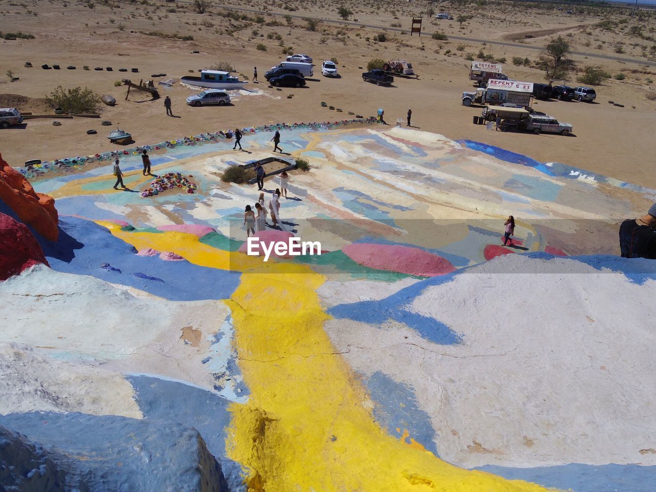 HIGH ANGLE VIEW OF PEOPLE ENJOYING ON BEACH