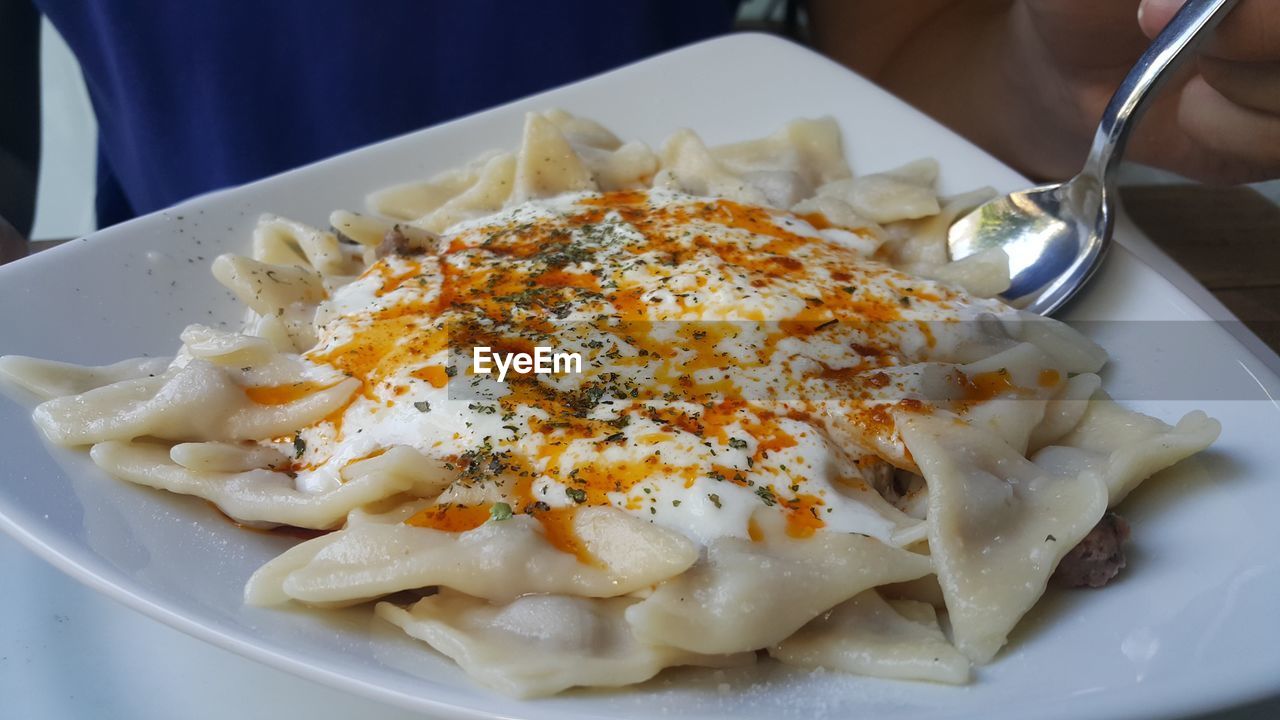 Close-up of manti pasta served in plate