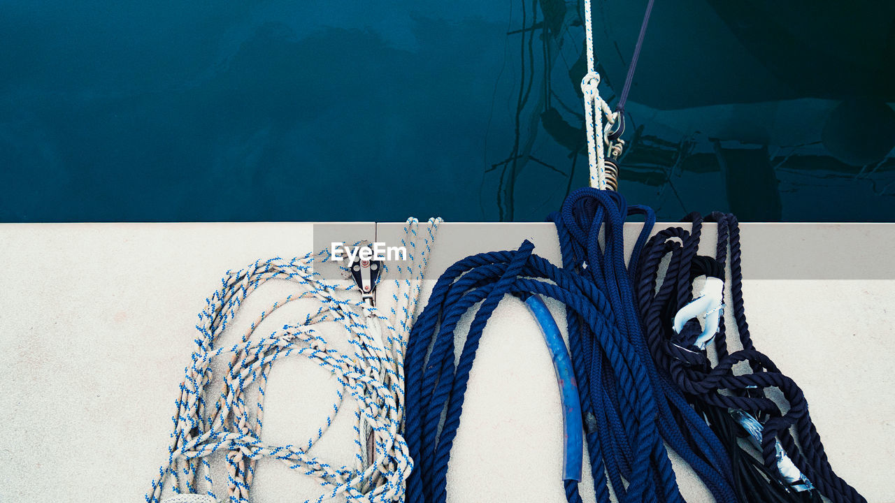 High angle view of ropes on boat in sea