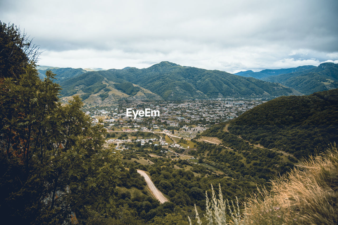 Scenic view of city against sky