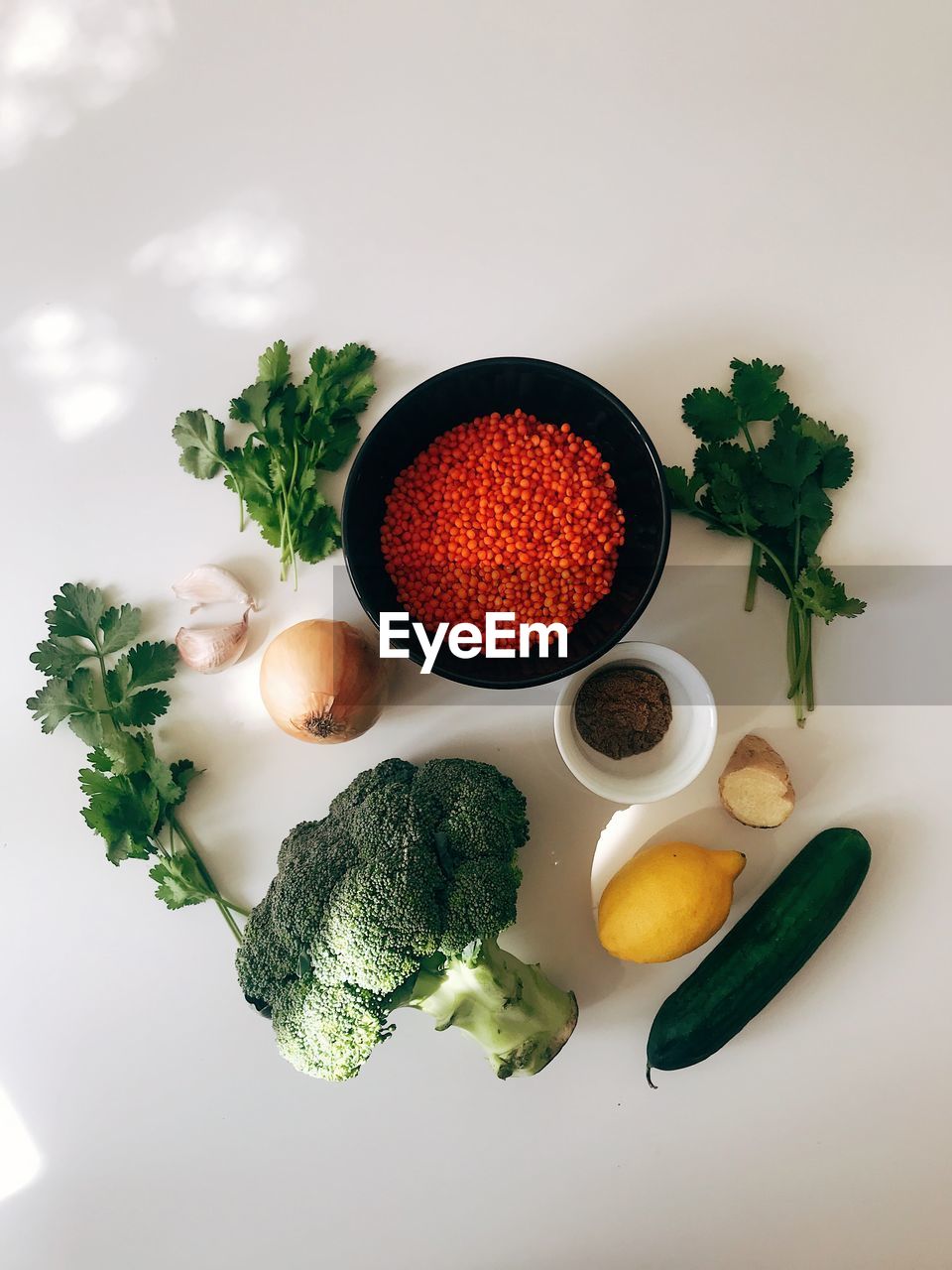 HIGH ANGLE VIEW OF VEGETABLES AND CANDIES