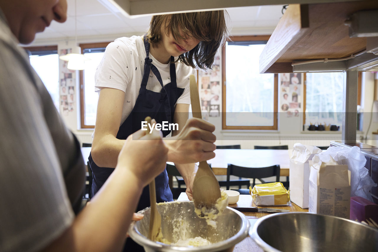 Women in kitchen preparing food