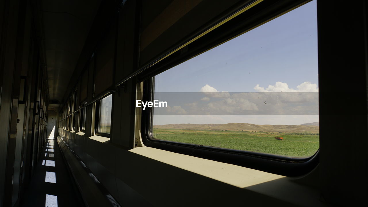 Scenic view of train seen through window
