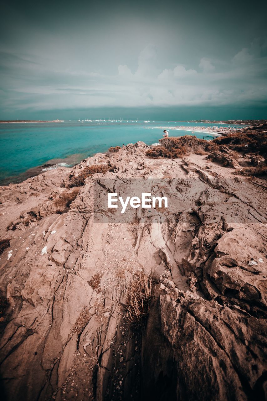 Scenic view of beach against sky