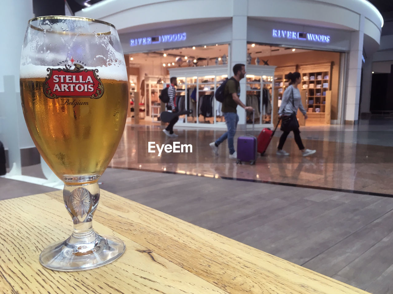 CLOSE-UP OF WINE IN AIRPORT