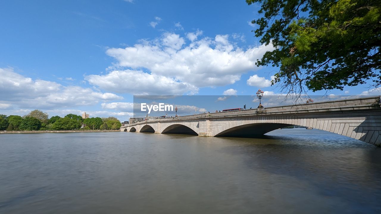 Bridge over river against sky