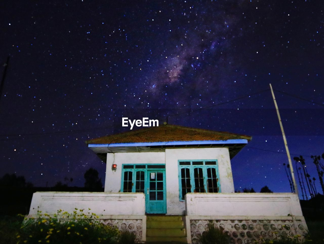 Low angle view of building against sky at night