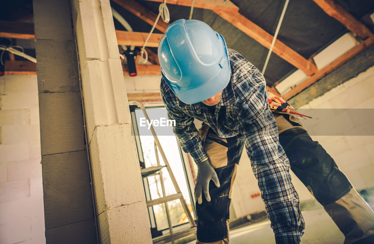 low section of man working in workshop