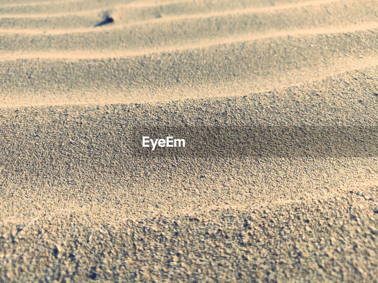 Full frame shot of sand on land