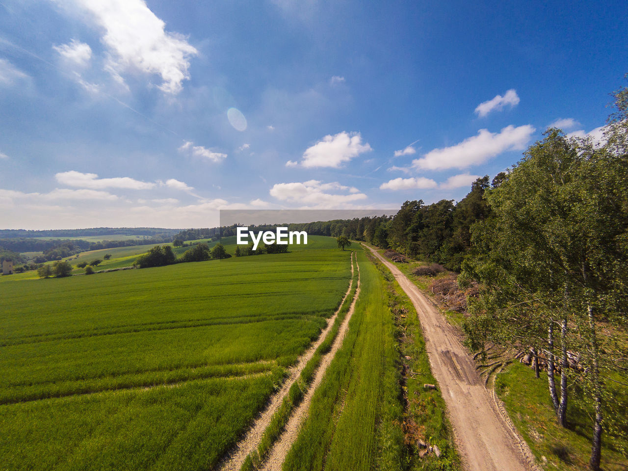SCENIC VIEW OF FARM AGAINST SKY