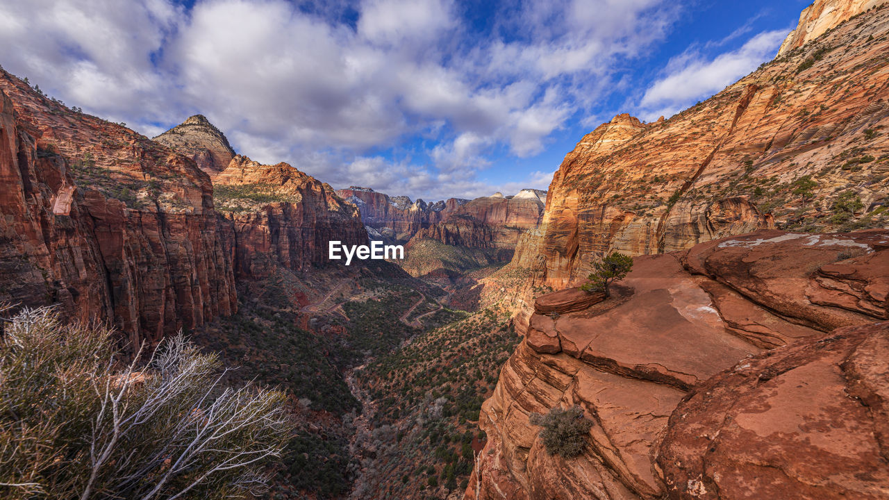 PANORAMIC VIEW OF ROCK FORMATIONS AGAINST SKY
