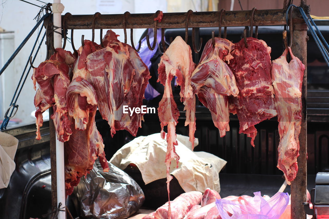 Close-up of meat for sale at market stall