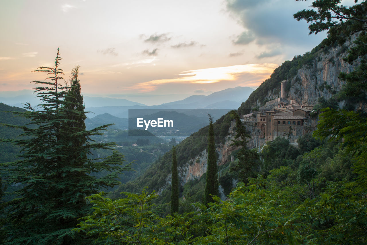 Scenic view of mountains against sky during sunset