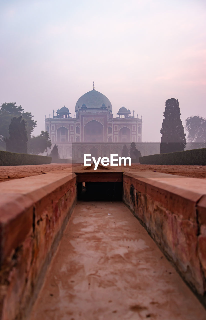 Humayun tomb at misty morning from unique perspective