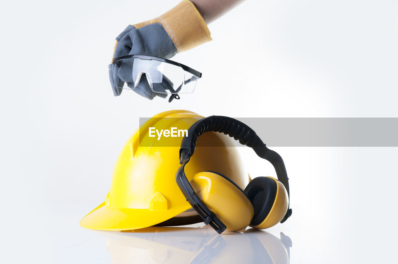 CLOSE-UP OF UMBRELLA ON WHITE BACKGROUND