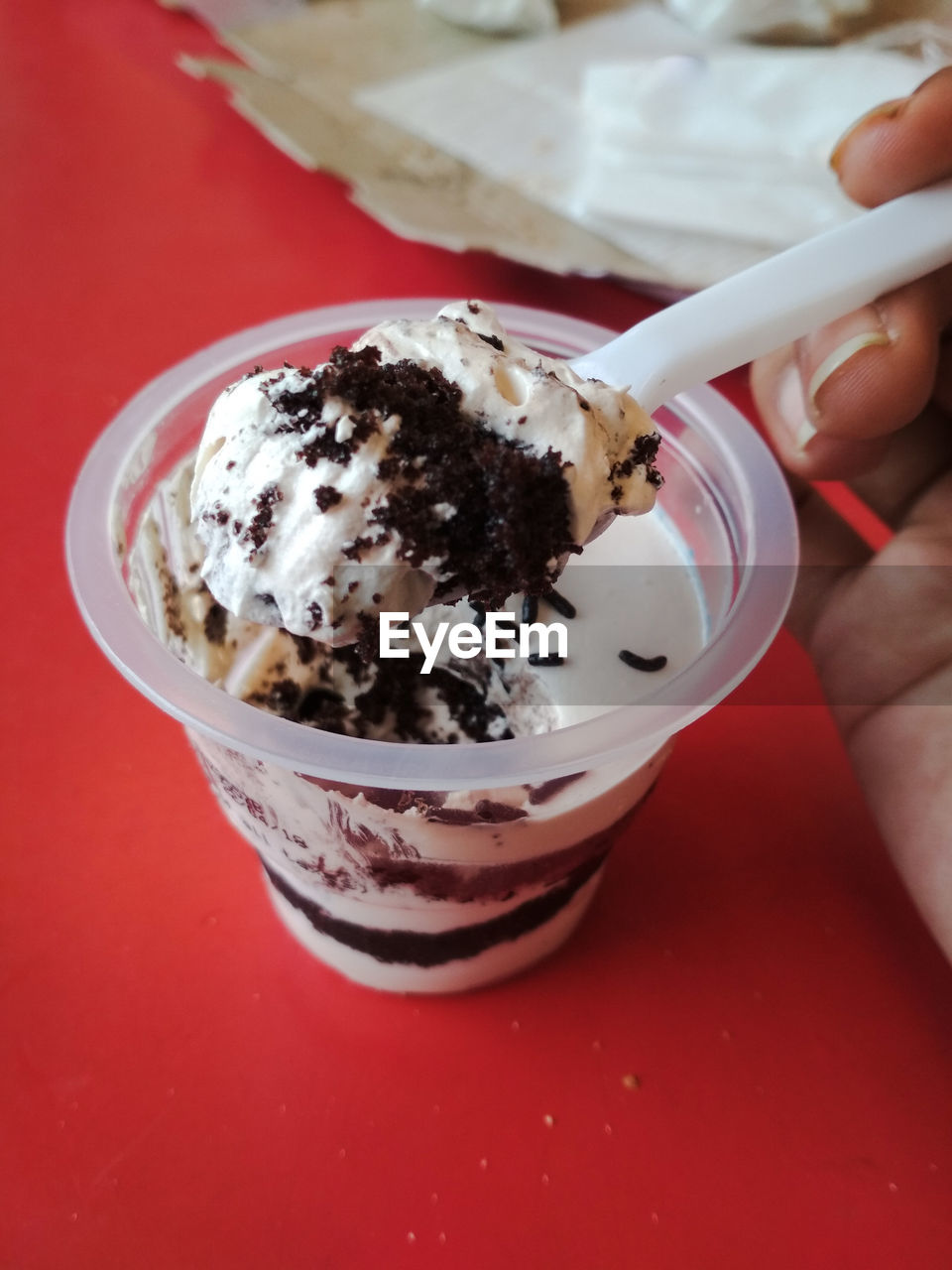 Close-up of hand holding ice cream