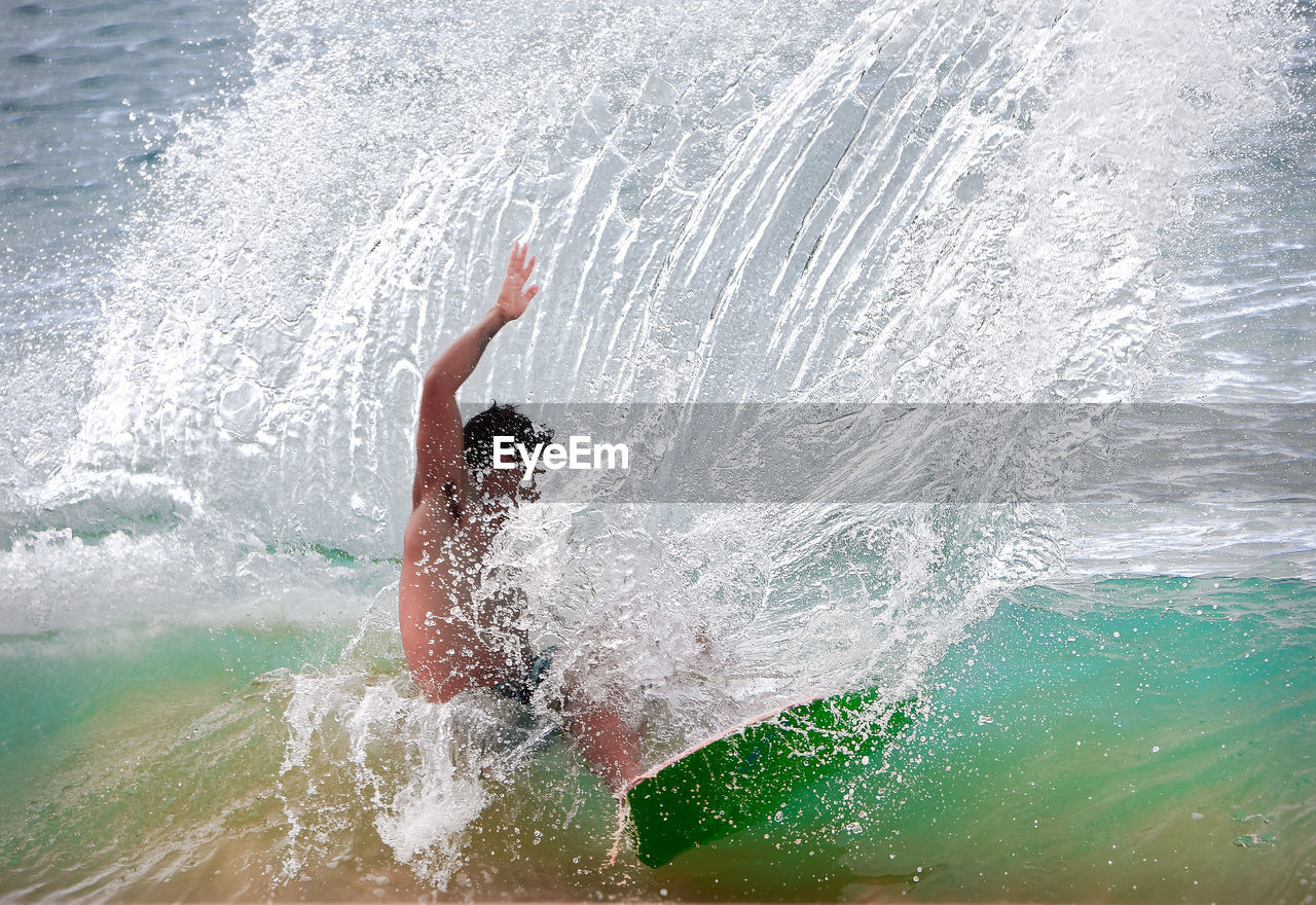 Man surfing in sea