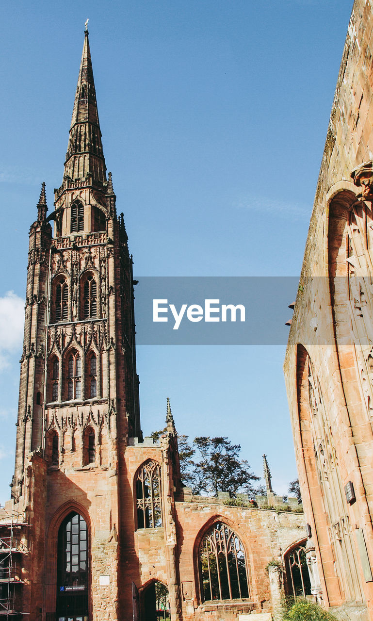 LOW ANGLE VIEW OF CATHEDRAL AGAINST SKY