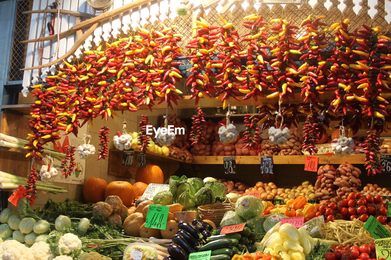 Various vegetables arranged for sale at market stall