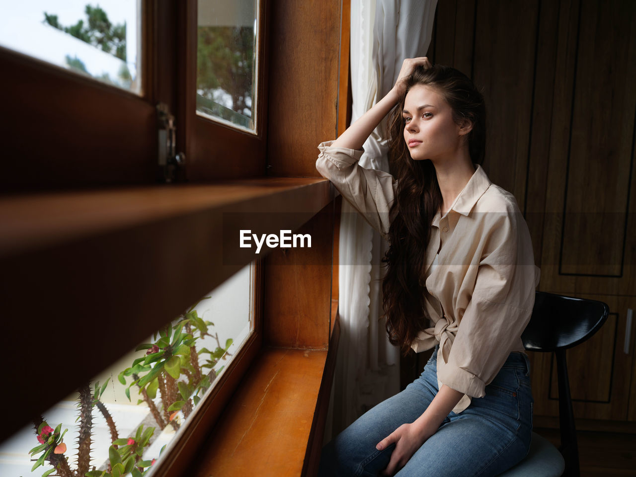 side view of young woman looking away