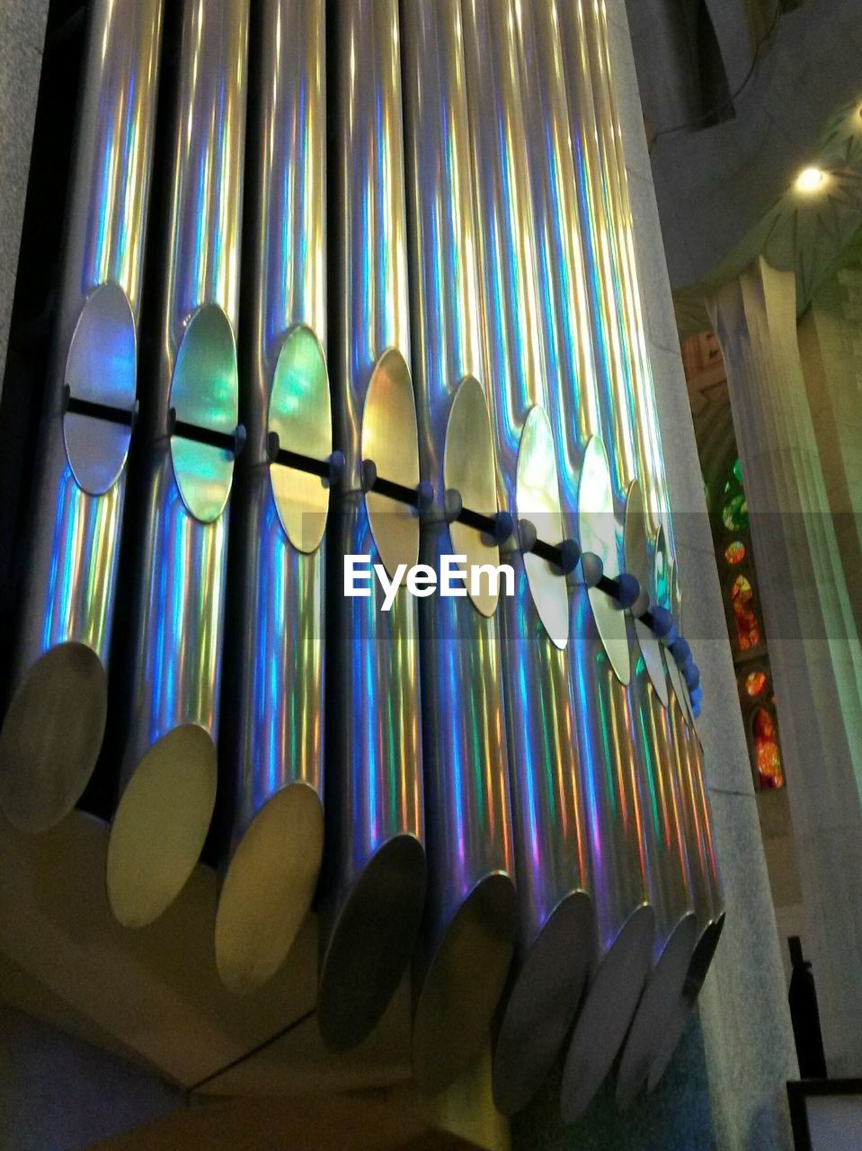 Low angle view of pipe organ in church