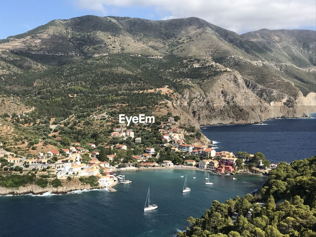 High angle view of townscape by sea
