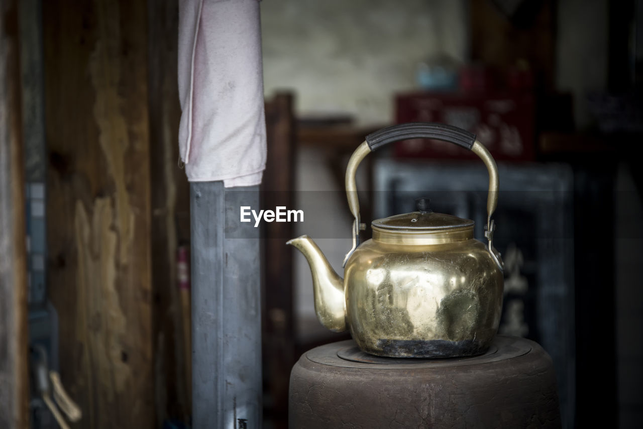 Close-up of kettle on table