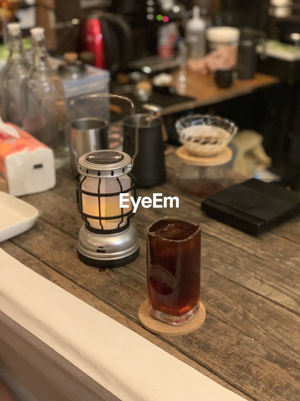 HIGH ANGLE VIEW OF DRINK IN JAR ON TABLE