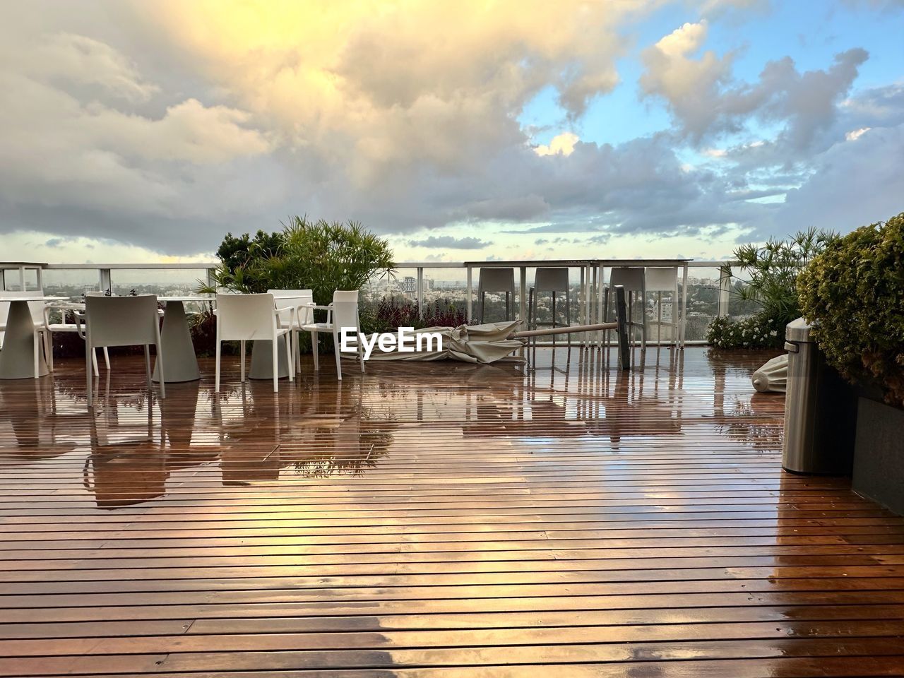 water, sky, cloud, architecture, nature, built structure, sunset, reflection, travel destinations, building exterior, wood, tree, building, no people, tropical climate, house, vacation, outdoors, tranquility, trip, holiday, travel, summer, beauty in nature, sea, plant, sunlight, relaxation, environment, wealth, tourism, land, residential district, luxury, scenics - nature, tourist resort, chair, beach, dock, pier, estate, city, palm tree, tranquil scene