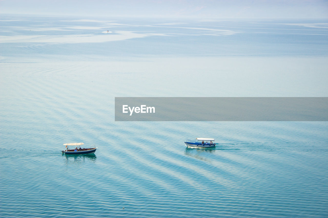 High angle view of nautical vessel on sea against sky