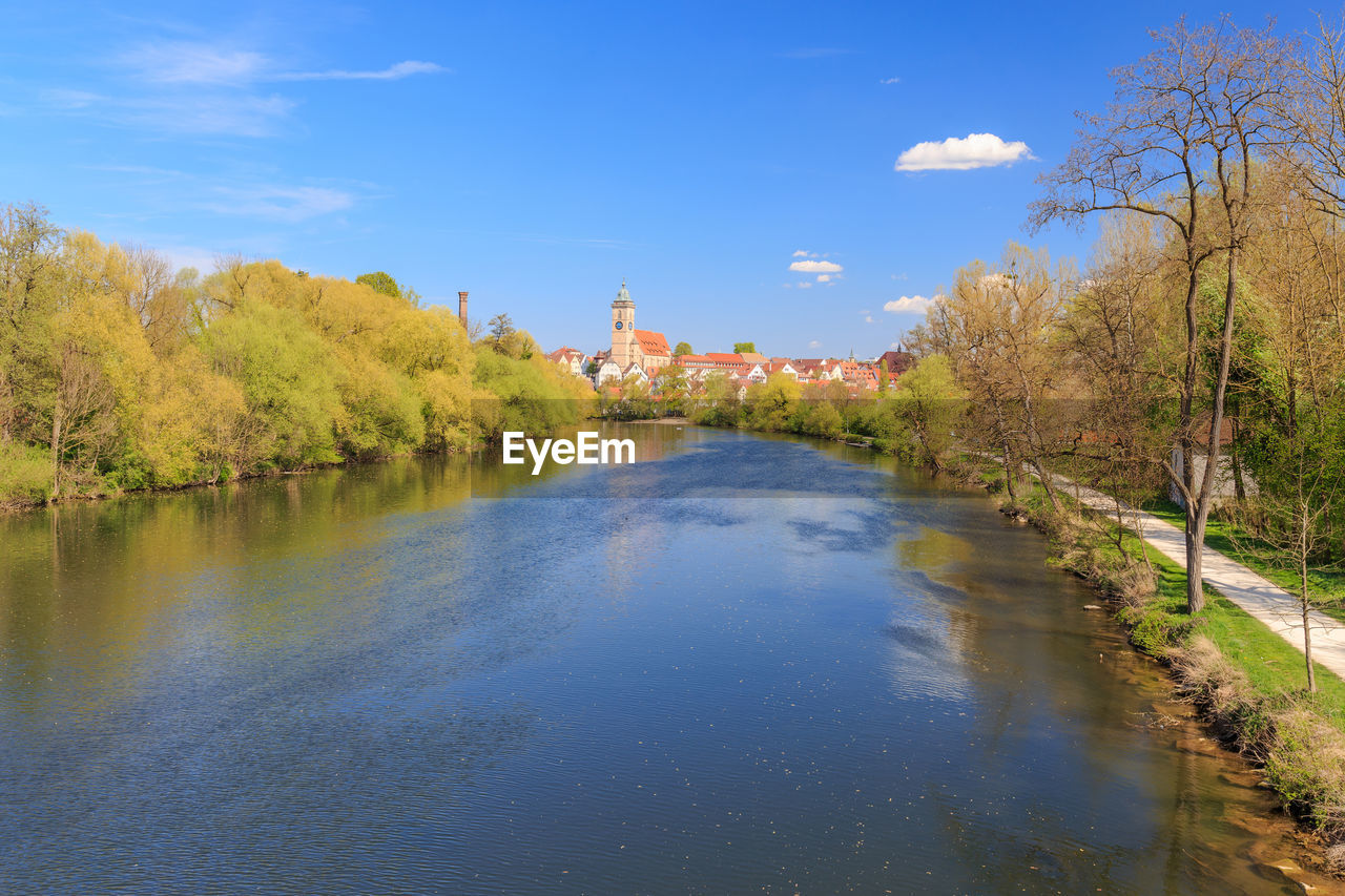 Scenic view of lake against blue sky