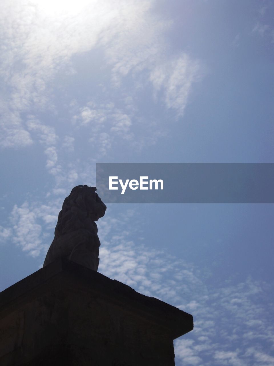 LOW ANGLE VIEW OF SCULPTURE AGAINST SKY