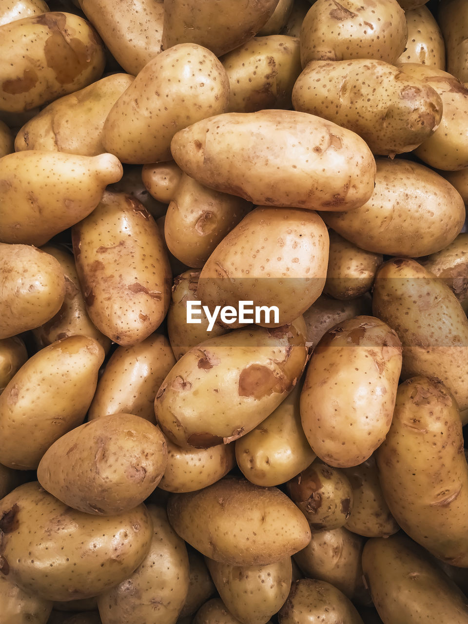 Full frame shot of potatoes for sale at market stall