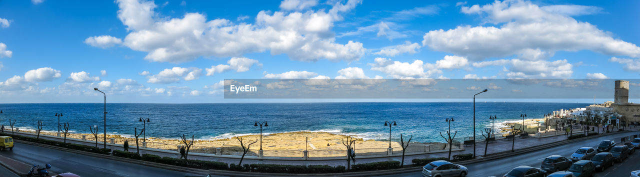 VIEW OF SEA AGAINST CLOUDY SKY