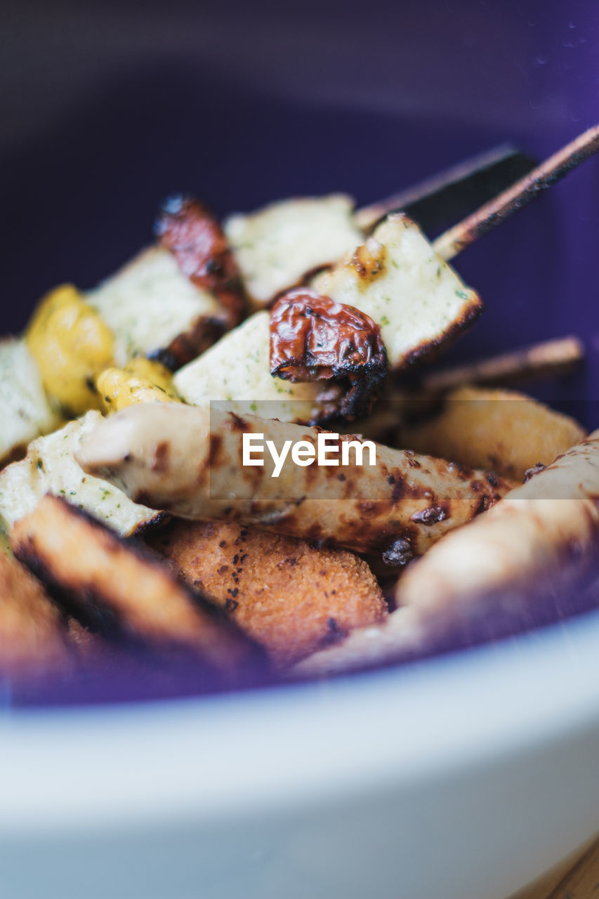 Close-up of grilled food served in bowl