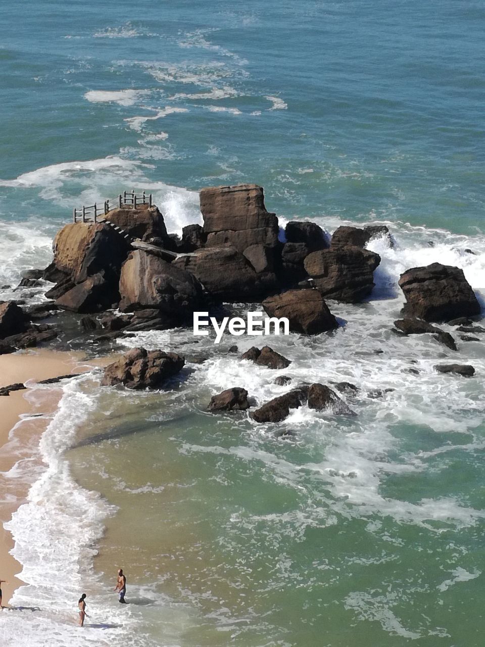 SCENIC VIEW OF SEA AND ROCKS AGAINST SKY