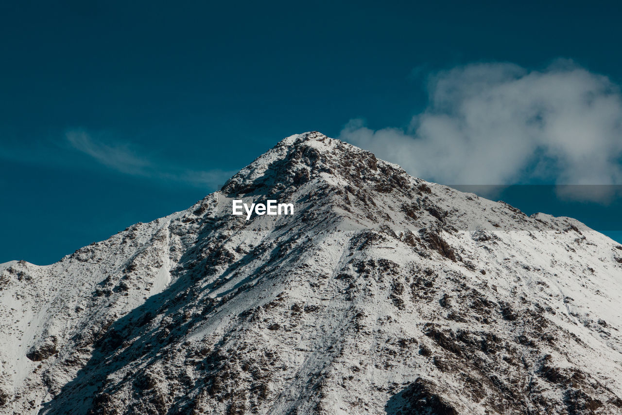 Low angle view of mountain against sky