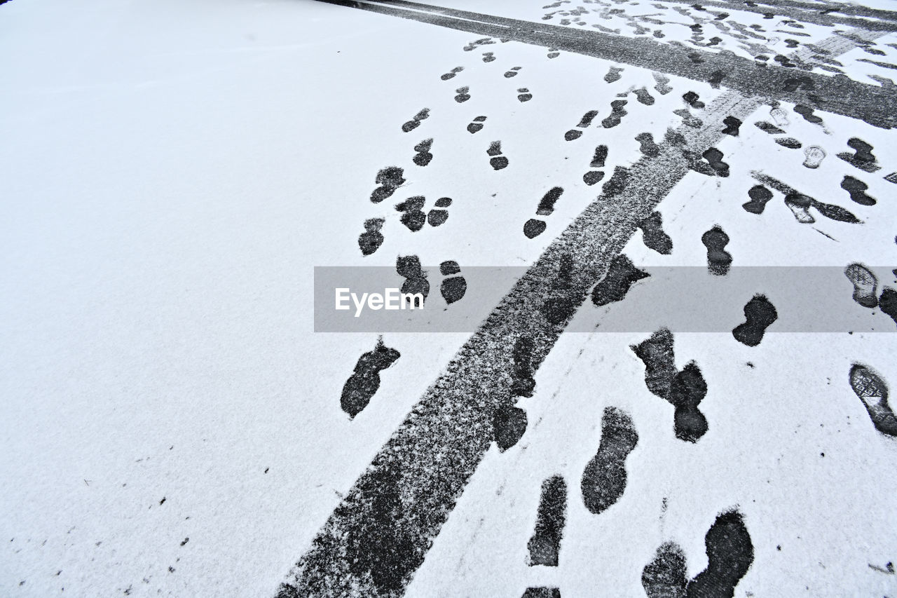 snow, nature, winter, day, high angle view, cold temperature, no people, black and white, monochrome, footprint, water, freezing, white, monochrome photography, land, outdoors, print, wet, close-up, transportation