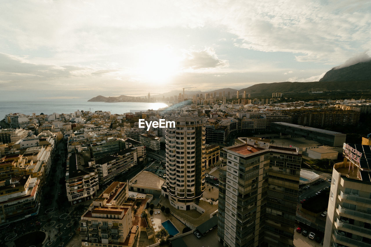 High angle view of buildings against sky in city