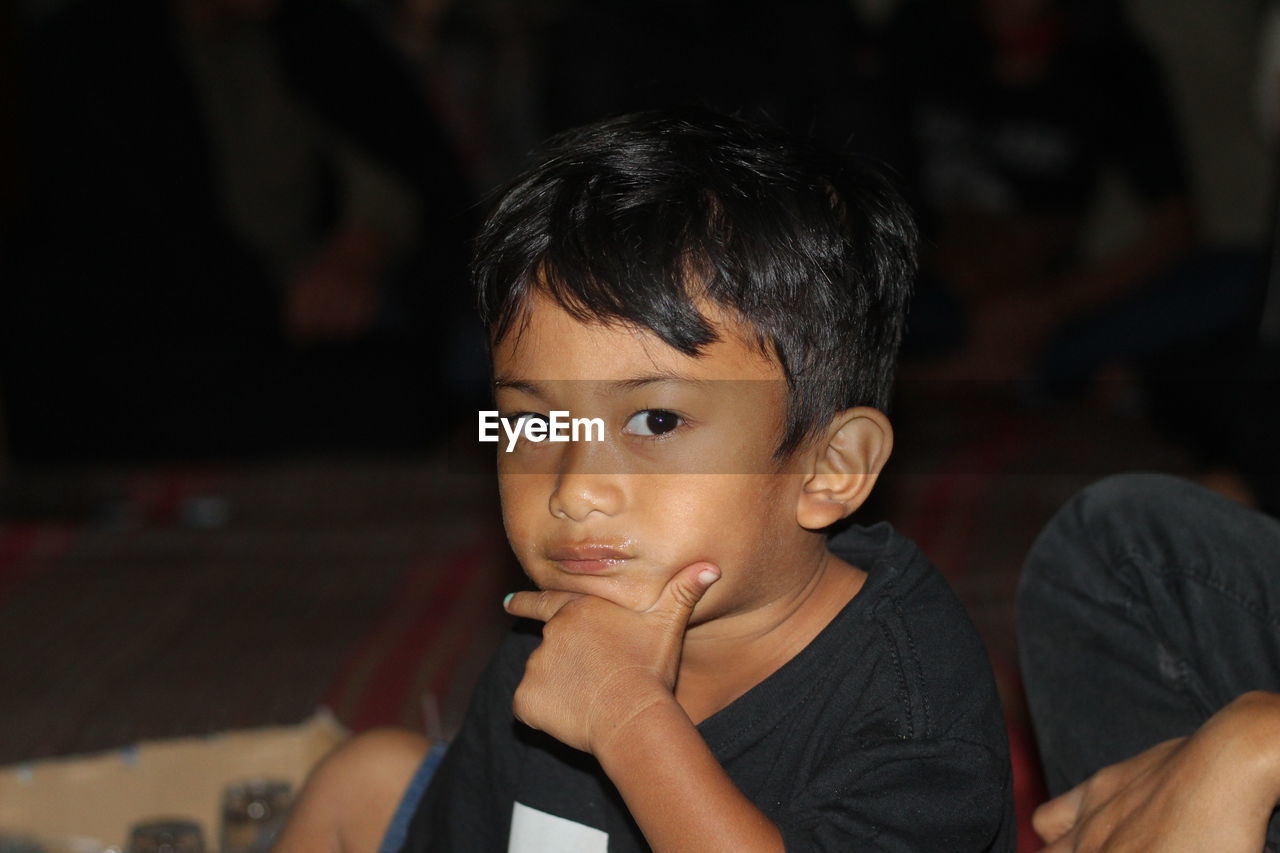 Portrait of boy sitting