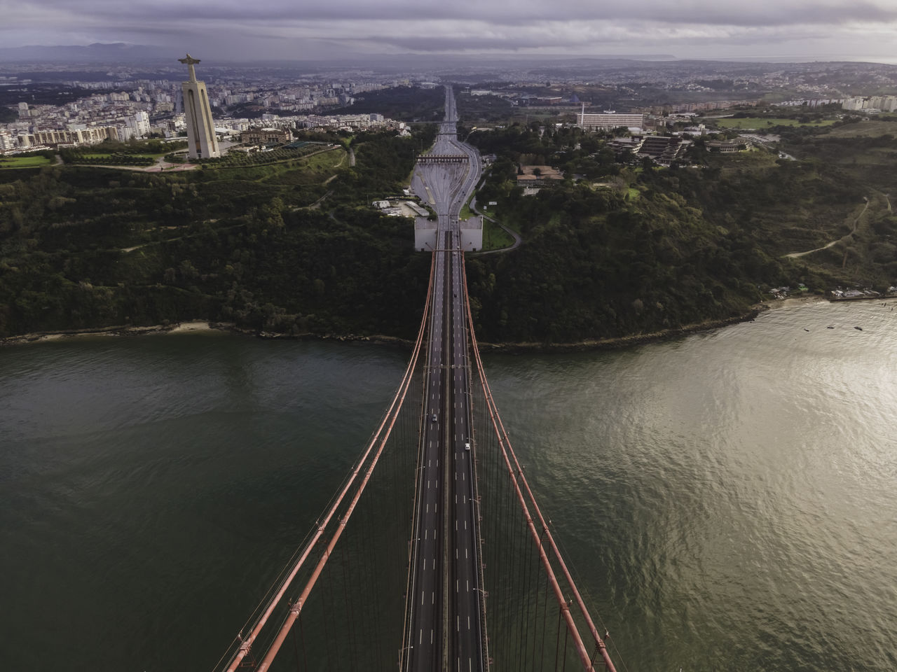 HIGH ANGLE VIEW OF BRIDGE ACROSS RIVER