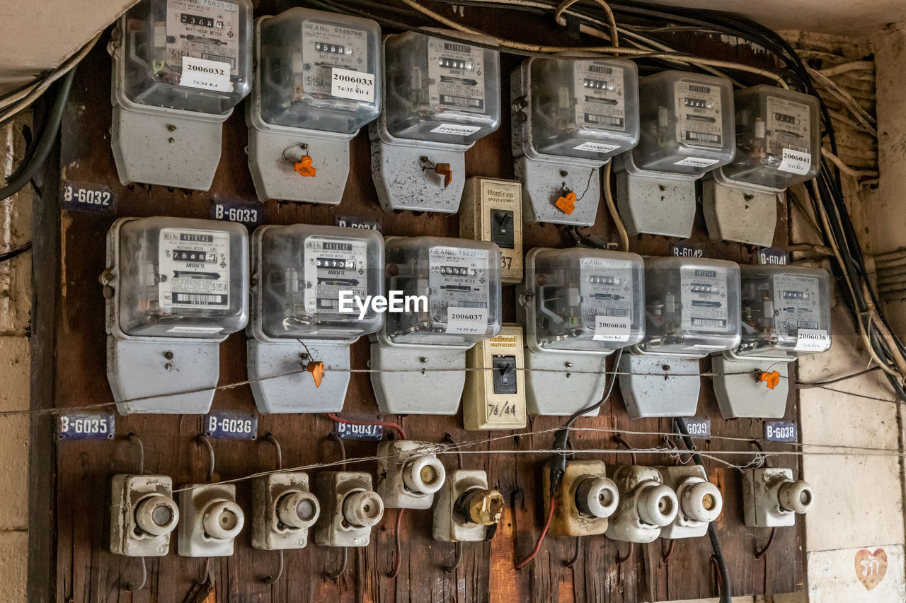 Close-up of electrical meters on wall