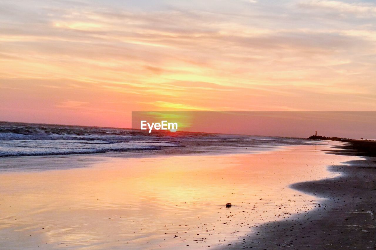 Scenic view of sea during sunset